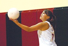 Eighth-grader Mariah Conko gets set to serve.