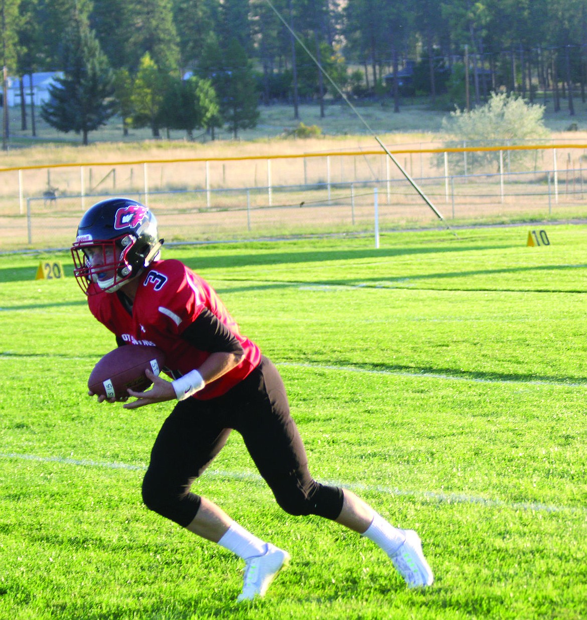 &lt;p&gt;Trevor Paro of the Hot Springs Savage Heat rushes the ball against St. Regis during Friday's game.&#160;&lt;/p&gt;