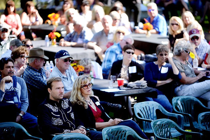 &lt;p&gt;Guthrie and Bonnie Quist listen to the various artists play at the Memorial Sendoff for Mark Wittman on Sunday, September 7, at their home in Creston. (Brenda Ahearn/Daily Inter Lake)&lt;/p&gt;