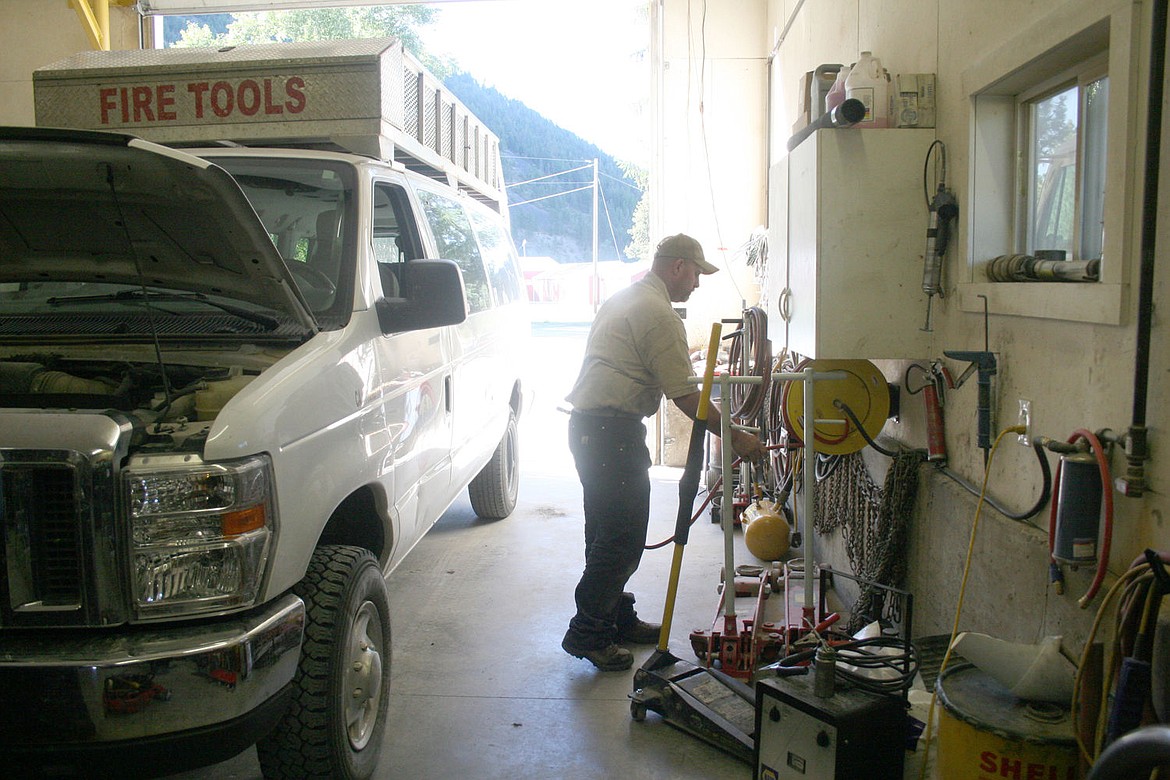 &lt;p&gt;Alec McKinney works on a vehicle in his stepdad's auto shop. After serving in the Air Force for 20 years he had planned on coming home to take over operation of the repair shop in Superior.&lt;/p&gt;