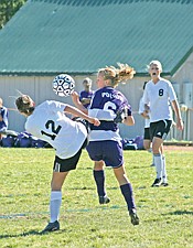 Senior wing Sarah Devlin fights for the ball and gets a rather rude awakening against Livingston.
