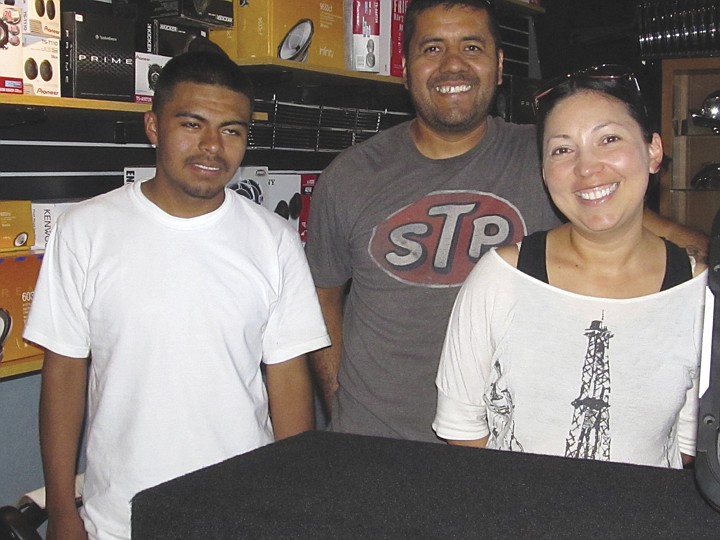 The staff at Cruzing Auto Accessories &amp; Audio in Mattawa,
from right, includes co-owner Inez Cruz, co-owner Aaron Cruz and
installation specialist Erik Plaza.