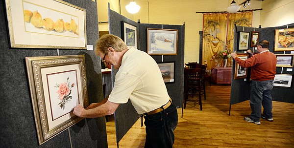 &lt;p&gt;Mark Ogle adds name cards to art work on Monday, September 9, at the Glacier Art Academy in the KM Building in Kalispell. (Brenda Ahearn/Daily Inter Lake)&lt;/p&gt;