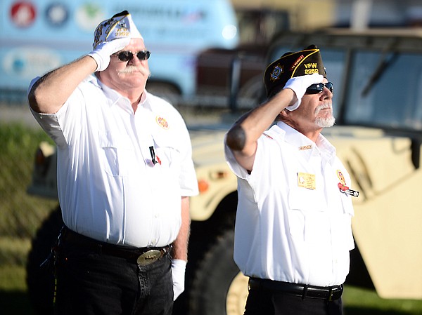 &lt;p&gt;From left, Carey Dill and Jerry Steward of the Veterans of Foreign Wars salute as the flag is raised at the flag pole dedication on Wednesday, September 11, at Smith Valley School. (Brenda Ahearn/Daily Inter Lake)&lt;/p&gt;