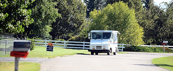 &lt;p&gt;Charlie Strong delivers mail along N Mission Drive on Tuesday, September 10, in Kalispell.&lt;/p&gt;