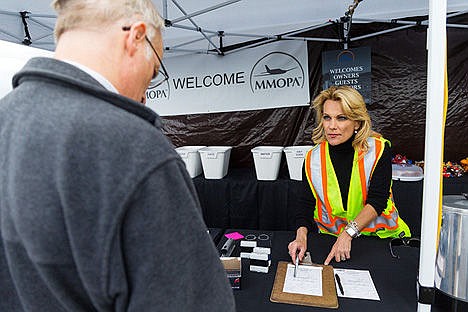 &lt;p&gt;Shannon Dunckel, helps a customer with a Southfield Aviation fuel order Wednesday at the Coeur d&#146;Alene Airport in Hayden. Dozens of pilots flew in to the airport to attend the Malibu Mirage Owners and Pilots Association Convention.&lt;/p&gt;