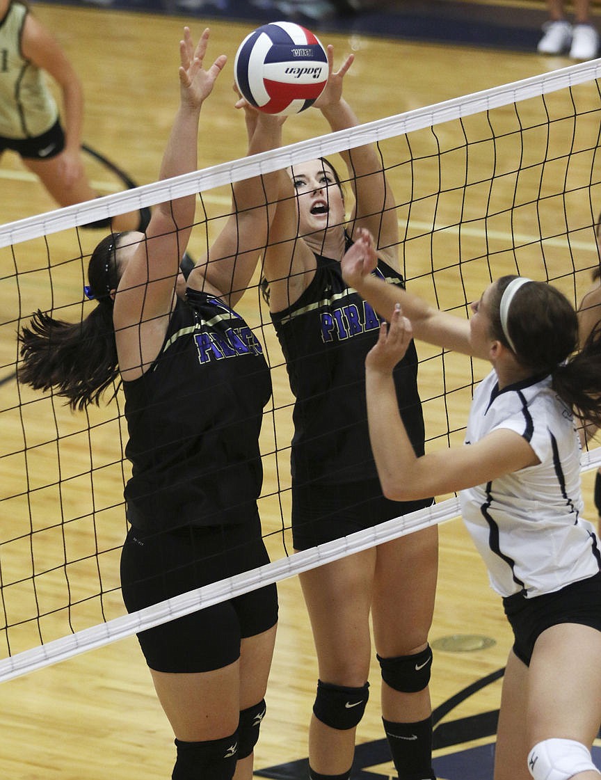 &lt;p&gt;Polson's Nicole Lake and Julia Sanderon block a hit from a Stevensville player on Saturday afternoon in Polson.&lt;/p&gt;