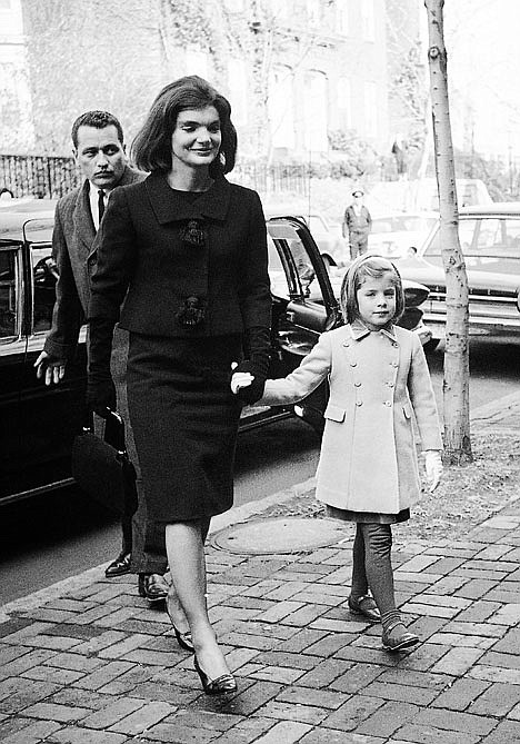 <p>Jacqueline Kennedy and her daughter, six-year-old Caroline, arrive at their new home in the Georgetown section of Washington on Dec. 6, 1963, two weeks after her husband was slain in Dallas, Texas. An ABC special with never-before-heard interviews with Jacqueline Kennedy aired Sept. 13. Viewers will hear the former first lady speak with historian Arthur Schlesinger Jr. about life in the White House and with her husband, President John F. Kennedy. The recordings were made months after the president's 1963 assassination and sealed until now.</p>