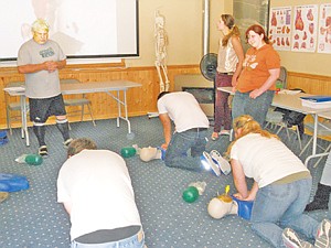 &lt;p&gt;Jay Moody oversees his high school students training for his EMT class.&lt;/p&gt;