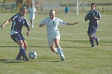 Lady Bulldogs win home conference opener