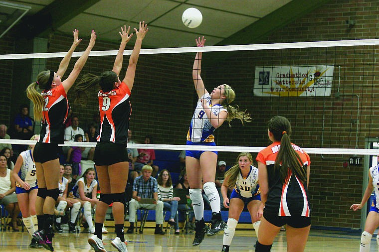 &lt;p&gt;Madison Fitchett takes on Ronan defenders at the net during a recent game in Thompson Falls.&lt;/p&gt;