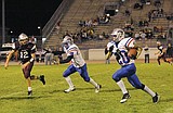 Cats edged by Maroons, 26-19