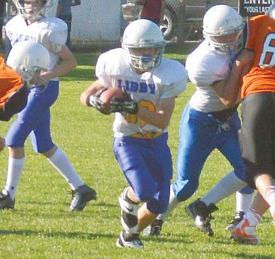&lt;p&gt;Number 32 Drew Ginther (7th grade) runs threw a huge clearing for a TD.&lt;/p&gt;