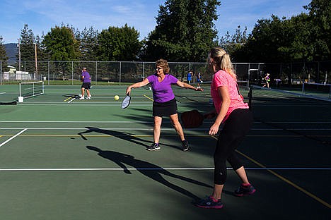 &lt;p&gt;Letha Rodrigues returns a serve from her opponents with her partner Selina Hoit&#160;in a match of pickeball Saturday afternoon at Northshire Park. The USA Pickleball Association counts 150,000 active pickleball players in the United States.&lt;/p&gt;