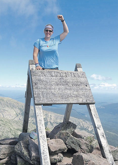 &lt;p&gt;Lori Barkley triumphantly poses at the top of Mount Katahdin in Maine this August, after completing the final stretch of her Appalachian Trail journey. Barkley dedicated the final 600 miles of her excursion to Tom McTevia, a prominent activist for handicap accessibility in Coeur d&#146;Alene.&lt;/p&gt;