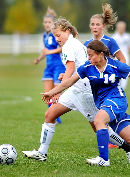 Whitefish senior Karissa DeMarco (3) and Columbia Falls junior McKenzie Kiser (14) battle for possession of the ball during their game on Thursday in Whitefish. The Bulldogs were a head 2 to 0 at halftime.