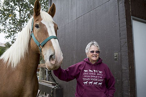 &lt;p&gt;Joy Crupper stands besides her 13-year-old draft horse Charlie on Tuesday at Crupper&#146;s home in Rathdrum.&lt;/p&gt;