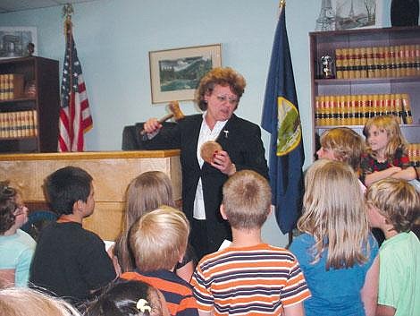 Photo by Diane Campbell Diane Campbell&#146;s Superior Elementary second grade class listens to a presentation from Justice Wanda James Thursday afternoon.