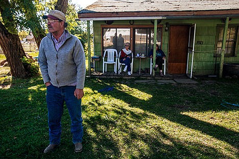 &lt;p&gt;Robin Micheletti, front, and Carlyn Dickerson, neighbors of Robert Wuest, watch the construction on Wuest&#146;s property from Micheletti&#146;s front yard across the street. Micheletti has lived in his house in Dalton Gardens for 25 years.&lt;/p&gt;