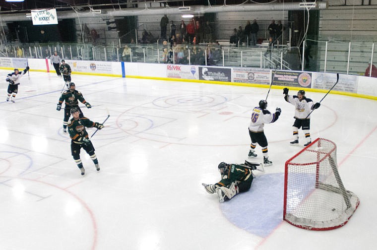 &lt;p&gt;Gillette players celebrate after scoring on Glacier's Jake Mullen (1) Thursday night during the Nationals' home loss to Gillette at the Stumptown Ice Den in Whitefish. Sept. 19, 2013 in Whitefish, Montana. (Patrick Cote/Daily Inter Lake)&lt;/p&gt;