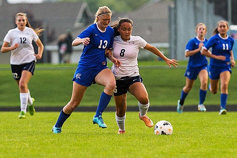 &lt;p&gt;Lake City High&#146;s Julia McCaw (8) and Coeur d&#146;Alene High&#146;s Meg Lowery (13) race for possession of the ball in the first half.&lt;/p&gt;