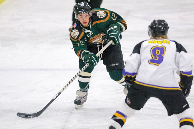 &lt;p&gt;Glacier's Paul Kinder (22) looks to move the puck up ice Thursday night during the Nationals' home loss to Gillette at the Stumptown Ice Den in Whitefish. Sept. 19, 2013 in Whitefish, Montana. (Patrick Cote/Daily Inter Lake)&lt;/p&gt;