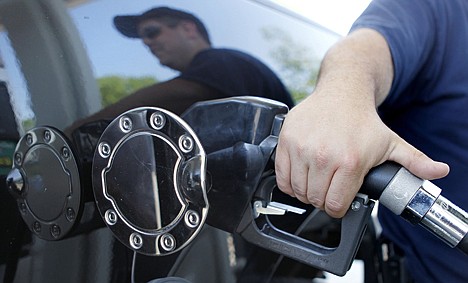 &lt;p&gt;Kevin Stearns of Oxford, Mass., fills up his pickup truck at a gas station in Milford, Mass. Consumer prices posted a small rise in August, but outside of a big jump in volatile gasoline prices inflation was essentially flat.&lt;/p&gt;