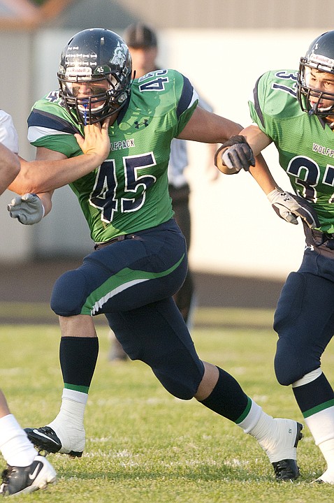 <p>Luke Halliburton (45) chases down the ball during Glaciers loss
to Helena High last Friday night at Legends Stadium.</p>