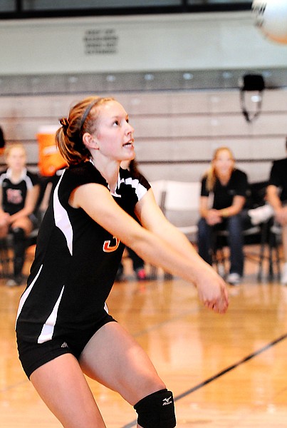 <p>Flathead junior Emily Russell passes ball during the first set
against Helena High.</p>