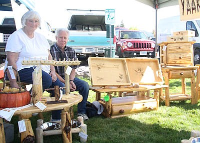 &lt;p&gt;Valerie and Jerry Cornwall-Brady of Yaak Valley Log Works, in their Kootenai Harvest Festival booth. Jerry is the craftsman, and Valerie creates the wood-burning designs. (Bethany Rolfson/The Western News)&lt;/p&gt;