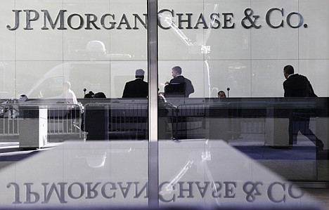 &lt;p&gt;In this May 11, 2012 file photo, people stand in the lobby of JPMorgan Chase headquarters in New York.&lt;/p&gt;