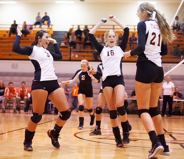 &lt;p&gt;Patrick Cote/Daily Inter Lake Flathead's Nouf Rashoodi (3), Emma Andrews (16) and Kwyn Johnson (21) celebrate a point Tuesday night during the Bravettes' home victory over Missoula Sentinel. Tuesday, Sept. 11, 2012 in Kalispell, Montana.&lt;/p&gt;