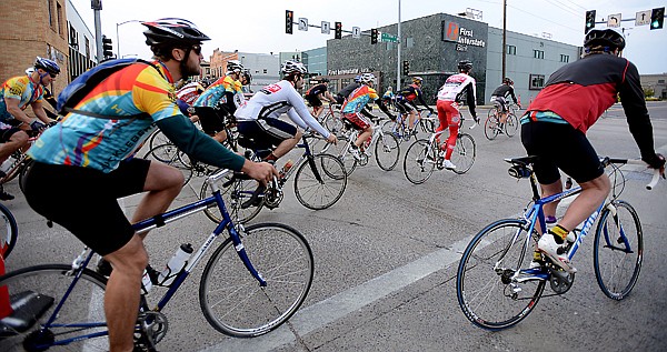 &lt;p&gt;The first wave of fifty riders make their way along Center Street across Main Street at the start of the Huckleberry 100 on Saturday morning, September 15, in downtown Kalispell.&lt;/p&gt;