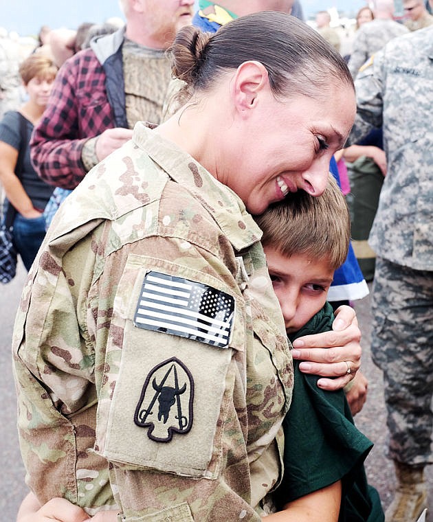 &lt;p&gt;Sgt. Aimee Schmidt hugs her son Colton Saturday afternoon during the return of the 495th at the Glacier Jet Center at Glacier Park International Airport. Sept. 21, 2013 in Kalispell, Montana. (Patrick Cote/Daily Inter Lake)&lt;/p&gt;