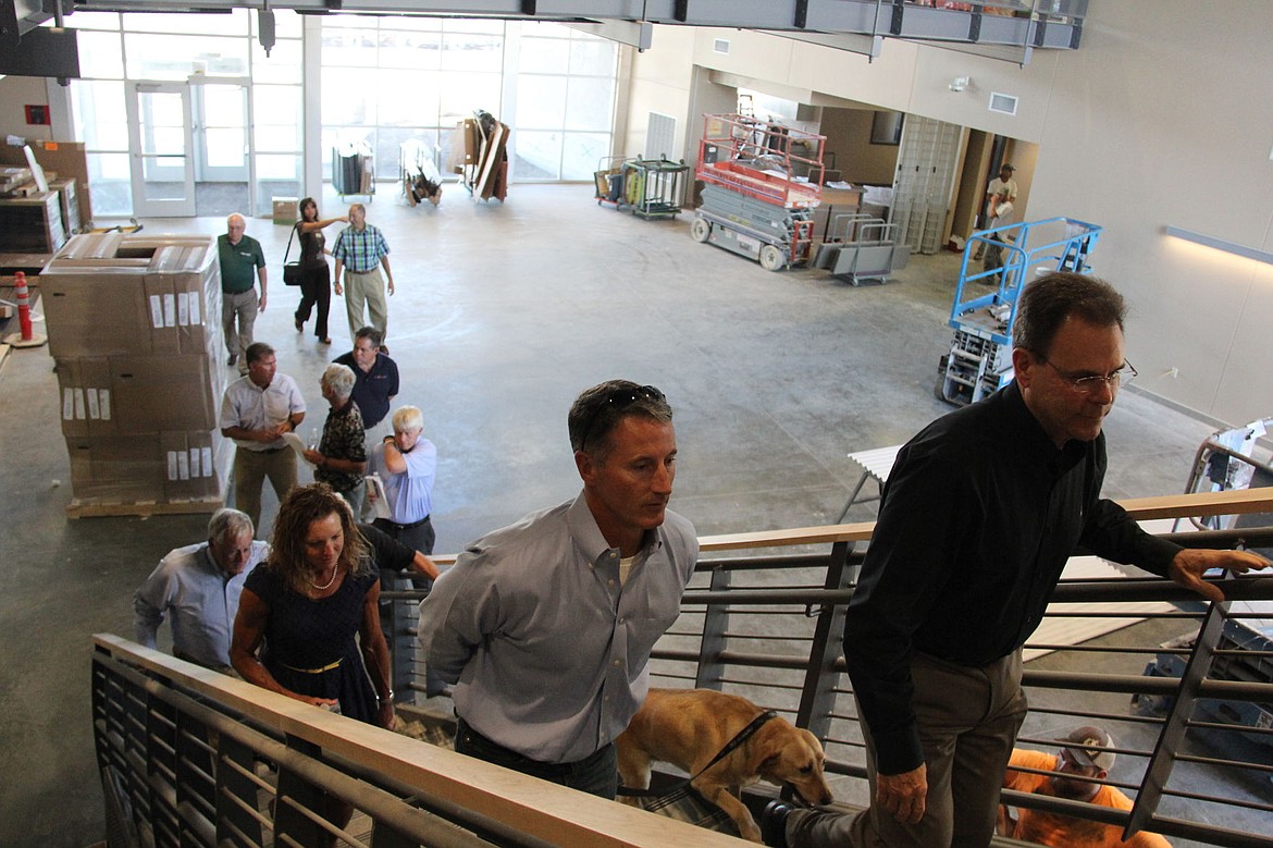 &lt;p&gt;Walking up the stairs in the soon-to-be named NIC Parker Career and Technical Education Facility during a recent tour are, from top, NIC President Rick MacLennan, Jim Parker, Diane Parker and Doug Parker.&lt;/p&gt;