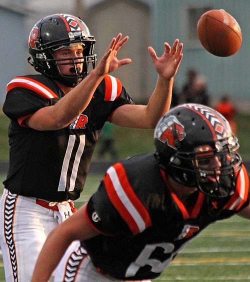 &lt;p&gt;Robbie Gauthier takes the snap in Ronan's game against
Townsend.&#160;&lt;/p&gt;