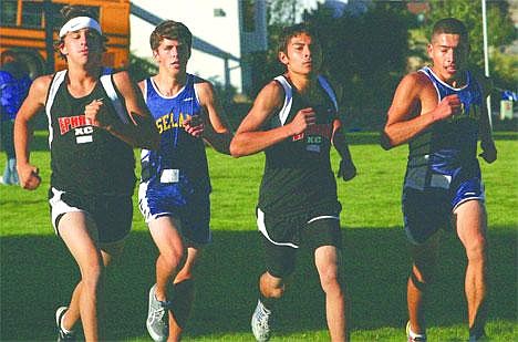 Ephrata's Quinton Hendrickson (far left) and Eddie Pineda (second from right) were the Tigers' top finishers on Thursday in their CWAC duals with Grandview, Prosser and Selah. Photo by Neil Pierson/Columbia Basin Herald.