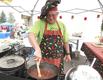 &lt;p&gt;Larry Hall stirs a pot of chili. His secret ingredients include meat, syrup and &quot;whatever else you like.&quot;&#160;&lt;/p&gt;