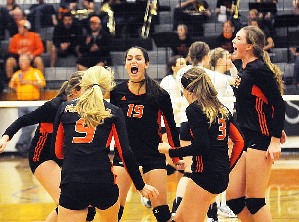 &lt;p&gt;Flathead's Alyssa Wisher (19) celebrates a kill during the fourth game with her teammates during the crosstown match against Glacier at Flathead on Tuesday. (Aaric Bryan/Daily Inter Lake)&lt;/p&gt;