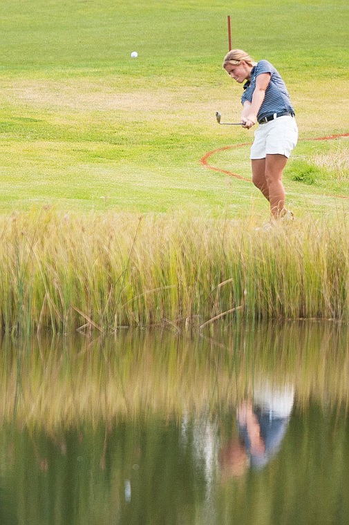 &lt;p&gt;Glacier&#146;s Teigan Avery chips over the water on the 11th hole Saturday morning during the Flatfish Invitational golf tournament at Buffalo HIll Golf Club.&#160;&lt;/p&gt;