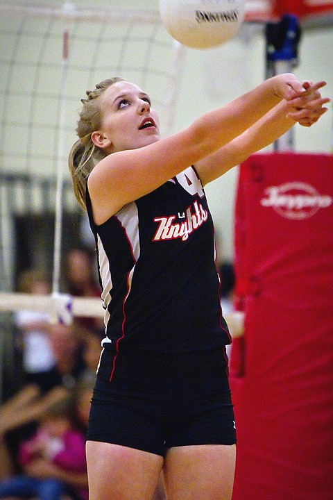 &lt;p&gt;Lakeside High's Jennifer Mitchell sends the ball over the net with a reverse hit during Tuesday's game against Coeur d'Alene Charter Academy.&lt;/p&gt;