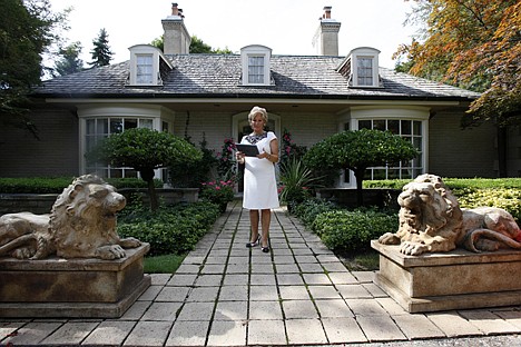 &lt;p&gt;In this Aug. 23, 2011 photo, real estate agent Ronni Keating waits outside for a client to view a home in Bloomfield Hills, Mich. Think of this housing market as bipolar. In the luxury sector, the recession is a memory and sales and prices are rising. But everywhere else, the market is moving sideways or getting worse. (AP Photo/Paul Sancya)&lt;/p&gt;