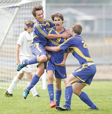 &lt;p&gt;Sage Friss, left, Cody Wood and Colin Maloney celebrate after Cody scores in the first half vs. Hamilton, 2-0 Loggers. Loggers go on to win 4-3.&lt;/p&gt;