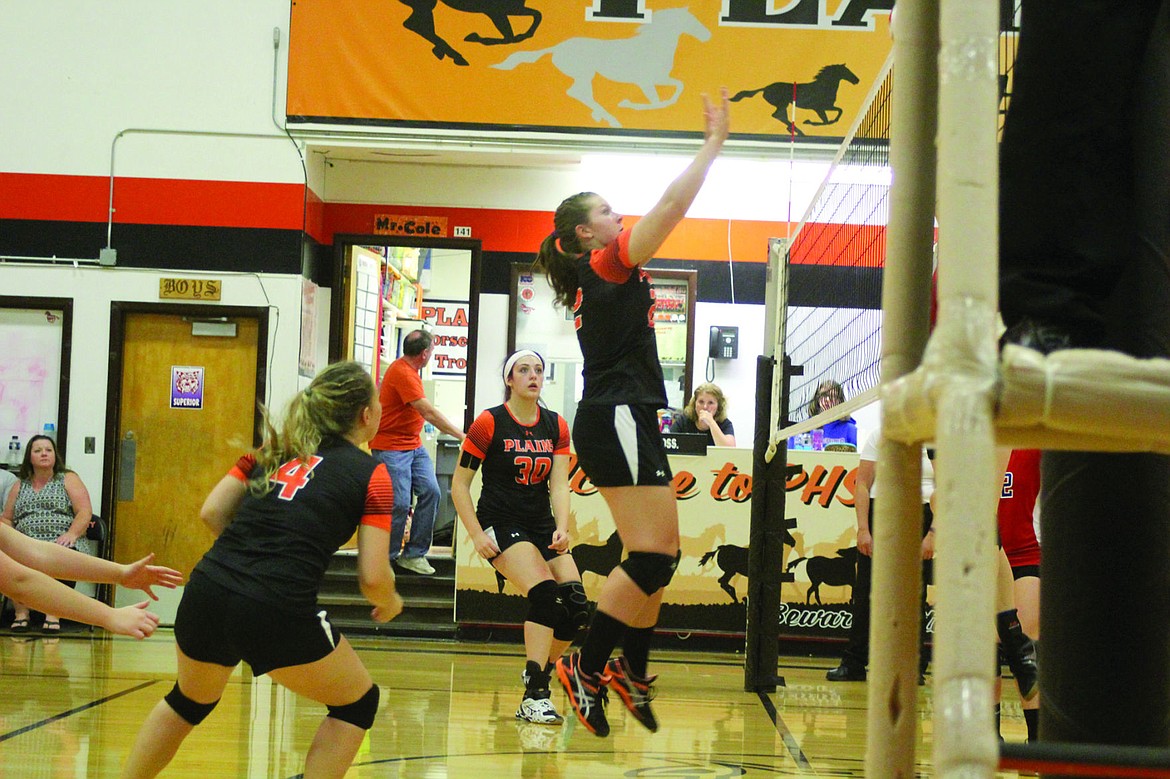 &lt;p&gt;Leah Thompson jumps to block a spike from the Superior Lady Cats. Leah Thompson jumps to block a spike from the Superior Lady Cats.&lt;/p&gt;