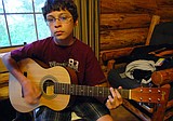 Local boys participate in guitar festival workshops
