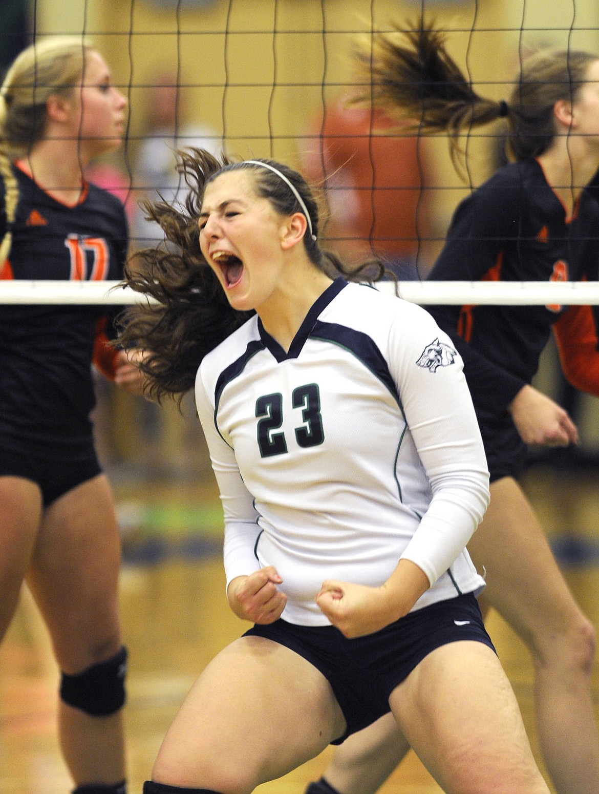 <p>Glacier's Nikki Krueger celebrates after a kill during the Wolfpack's 3-0 sweep of the Flathead Bravettes during the crosstown volleyball match at Glacier High School on Tuesday. (Aaric Bryan/Daily Inter Lake)</p>