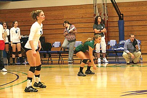 Big Bend CC head volleyball coach Michael De Hoog (right) gives direction to his Lady Vikings during last night&#146;s loss against Blue Mountain CC.