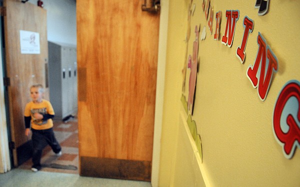 &lt;p&gt;Sam Plummer, 5, runs from the lockers back to his Early Learning
Center class after putting away his show and tell item on Friday
morning at Saint Matthew's.&lt;/p&gt;