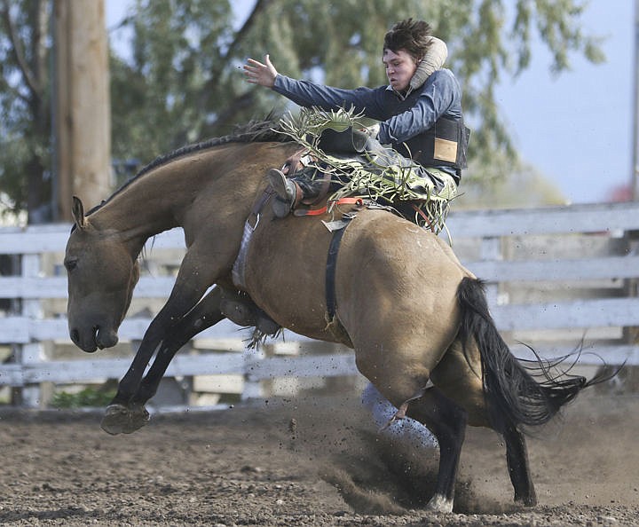 &lt;p&gt;Arlee's Tyler Adams competes in bareback riding at the high school rodeo in Polson on Saturday.&lt;/p&gt;