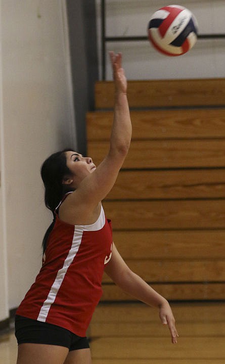 &lt;p&gt;Two Eagle River's Misty Blue Mendoza serves the ball on Thursday evening in Charlo.&lt;/p&gt;